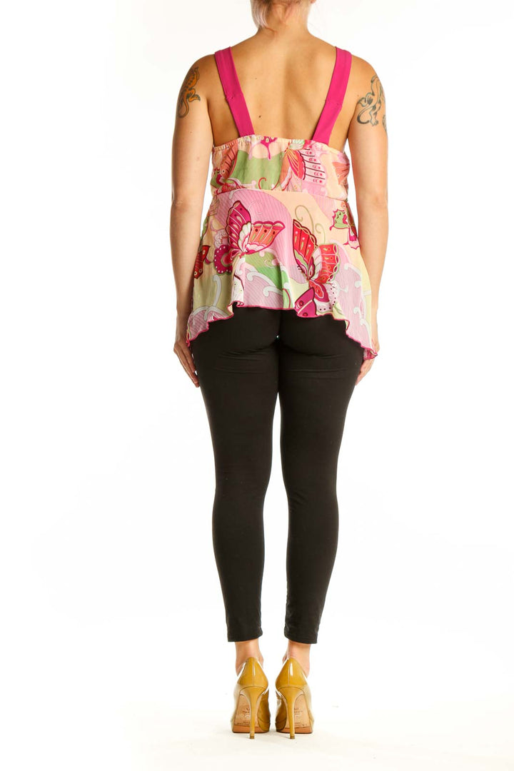 Pink floral empire waist tank top with fuchsia straps and asymmetrical hem, back view