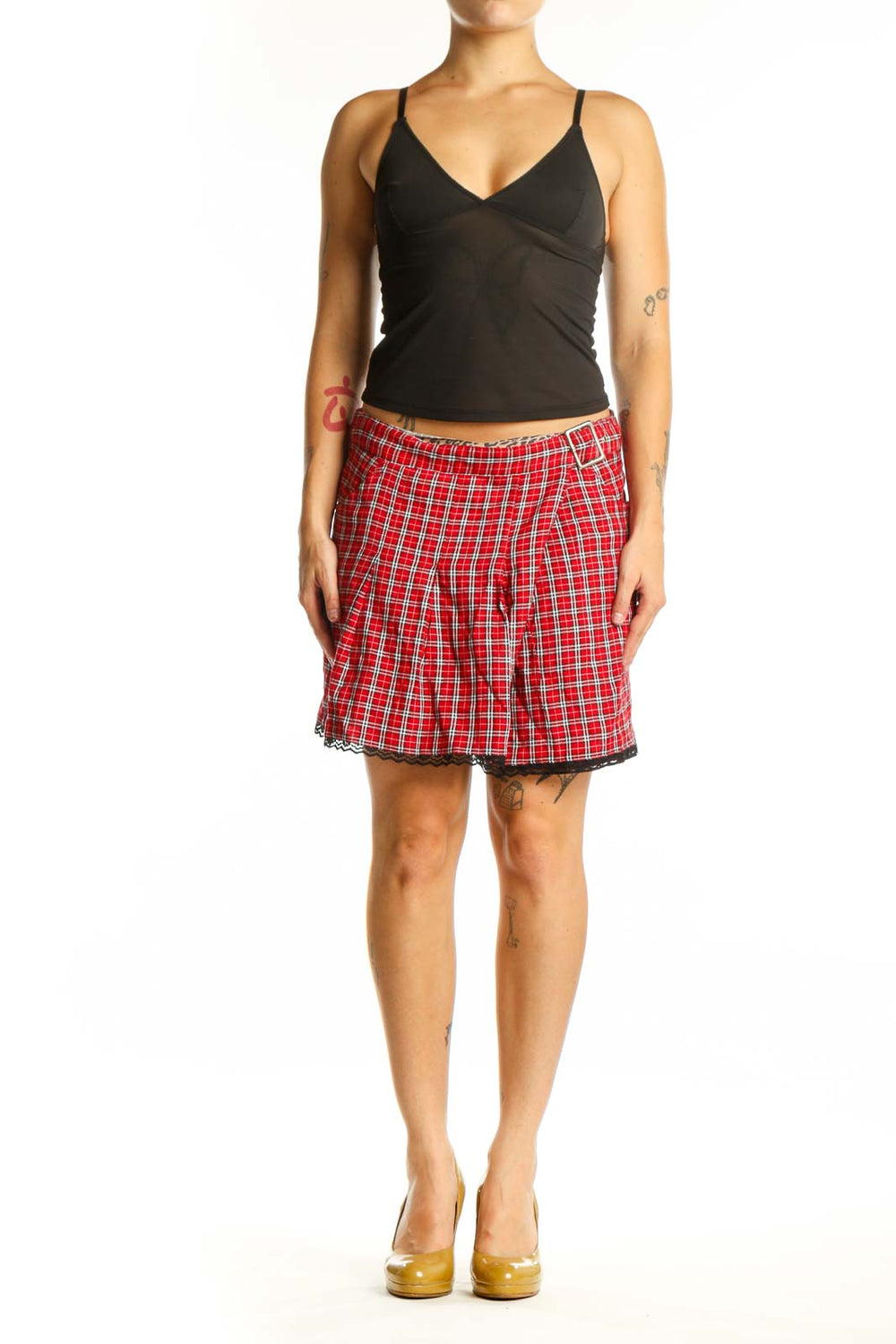 Red and white plaid mini skirt with pleated design and black lace trim, front view