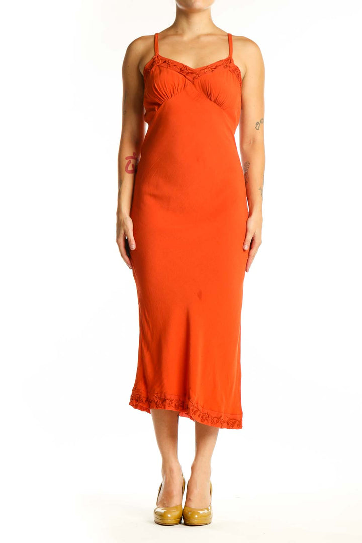Orange viscose slip dress with ruched sweetheart neckline and spaghetti straps, front view