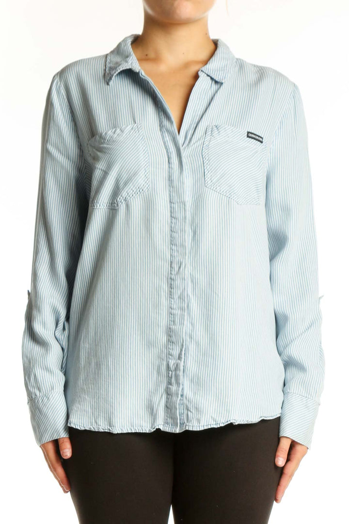 Light blue and white striped Calvin Klein Jeans button-up shirt with collar and long sleeves, front view