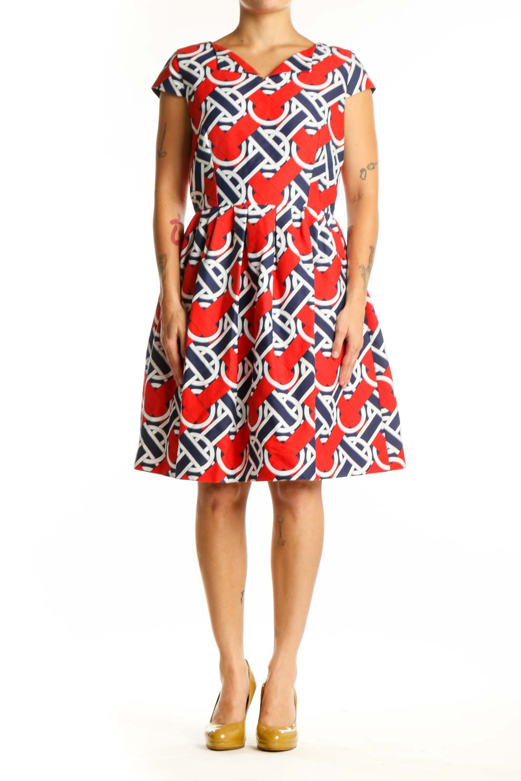 Red, navy, and white geometric print A-line dress with V-neckline and cap sleeves, front view