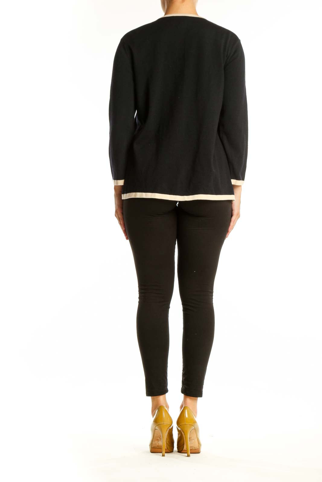 Back view of black ESCADA wool cardigan with cream trim detailing and three-quarter length sleeves
