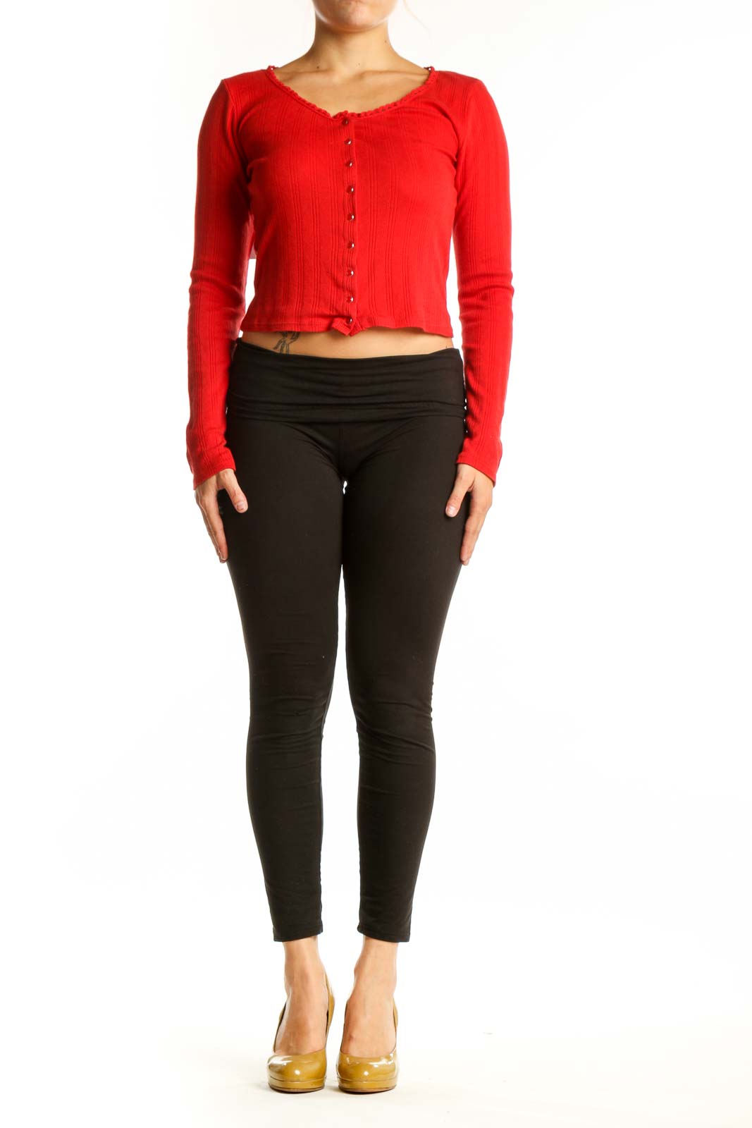 Red ribbed cotton crop cardigan with button-front closure, worn with black leggings