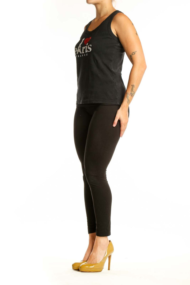 Black cotton tank top with white Eiffel Tower and red heart 'I Love Paris France' graphic design, front view