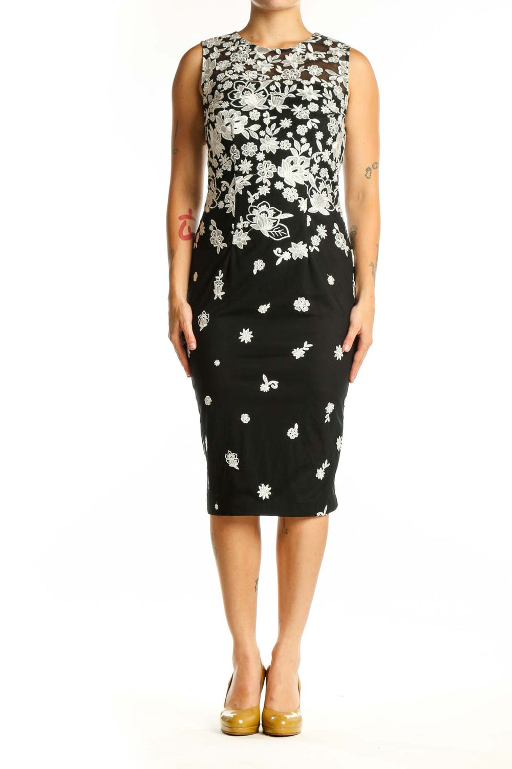 Black floral print midi dress with white ombre design, sleeveless crew neckline, fitted silhouette