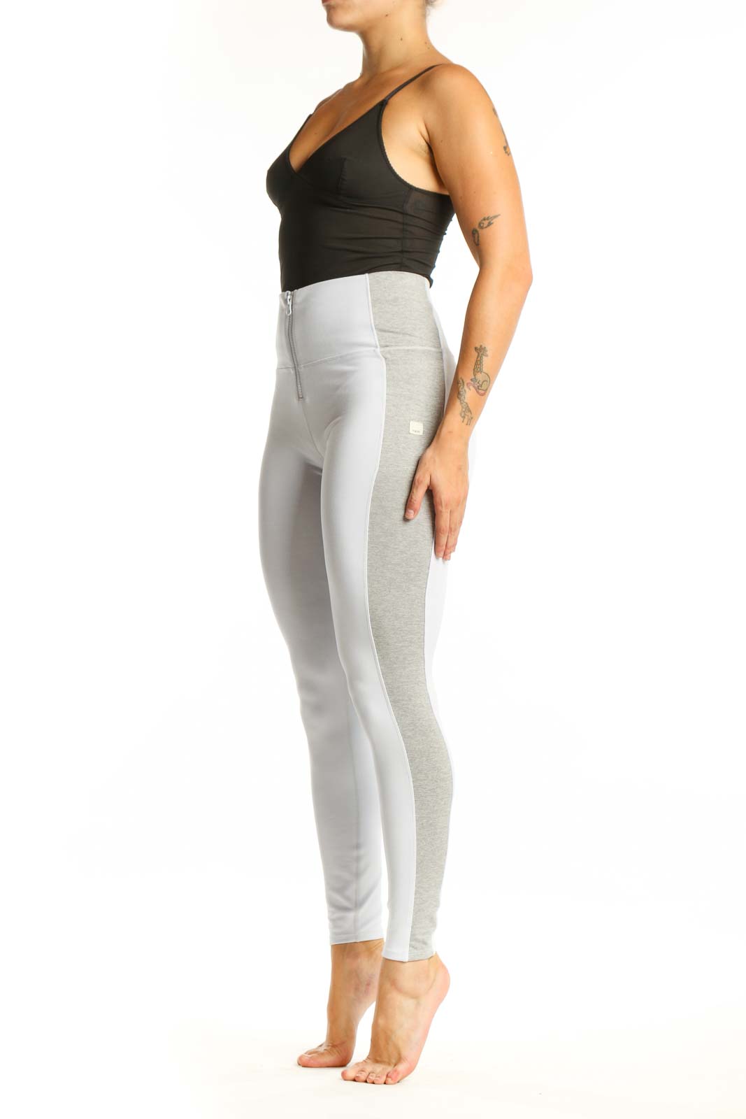 White high-waist activewear leggings with gray side paneling, front view