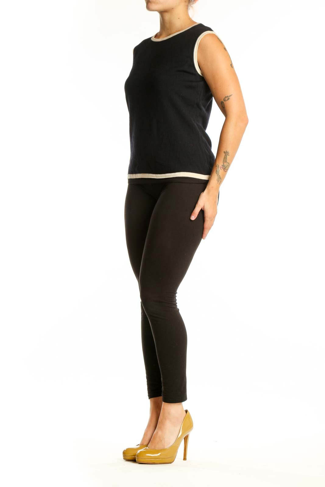 ESCADA black wool sleeveless tank top with cream trim, front view on model