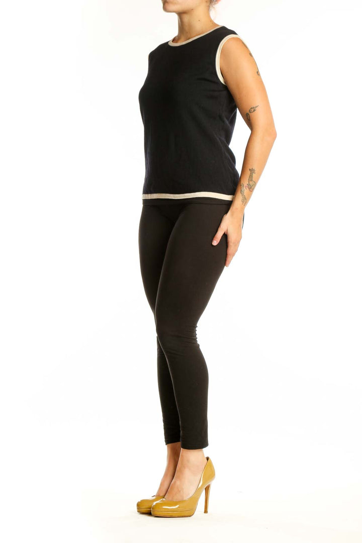 ESCADA black wool sleeveless tank top with cream trim, front view on model
