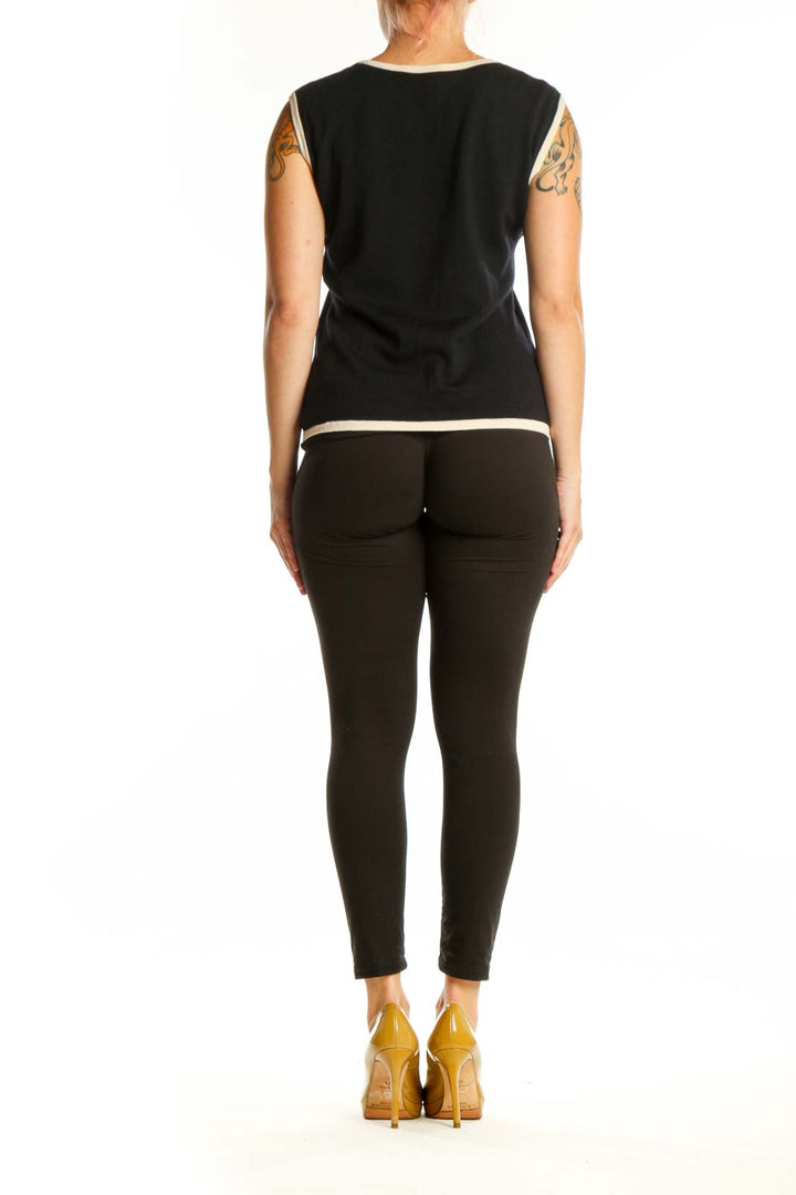 ESCADA black wool sleeveless tank top with cream trim, back view on model