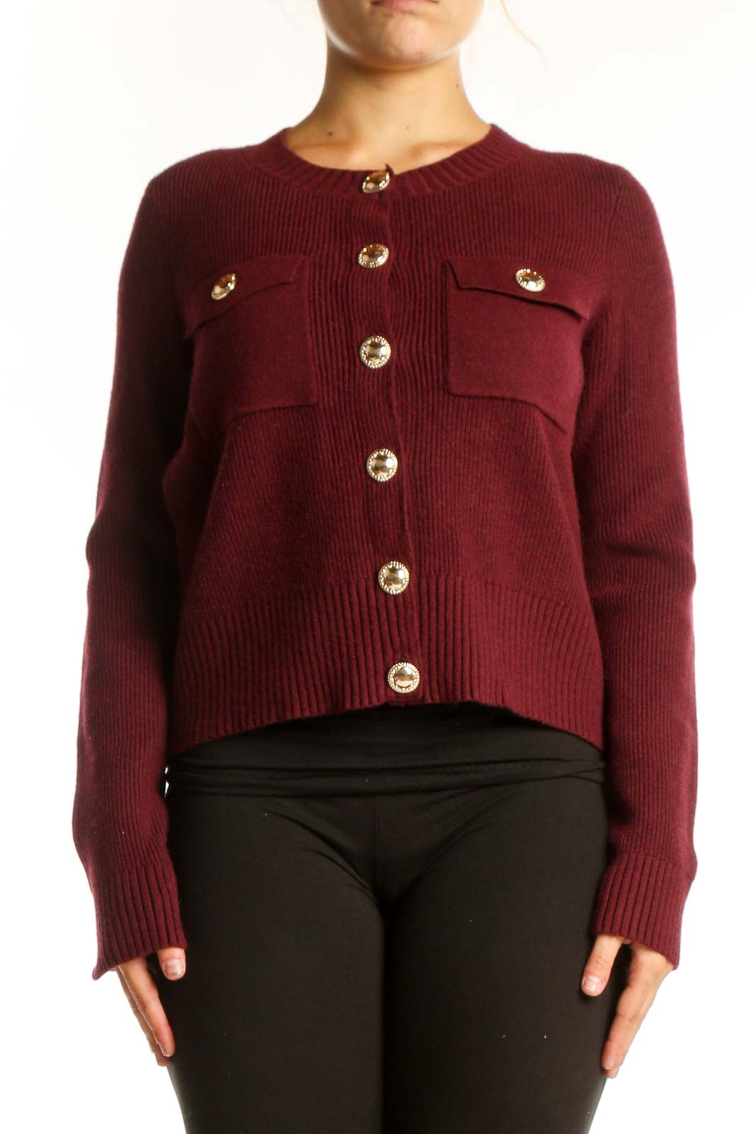 Burgundy ribbed knit cardigan with gold buttons and patch pockets, front view on model