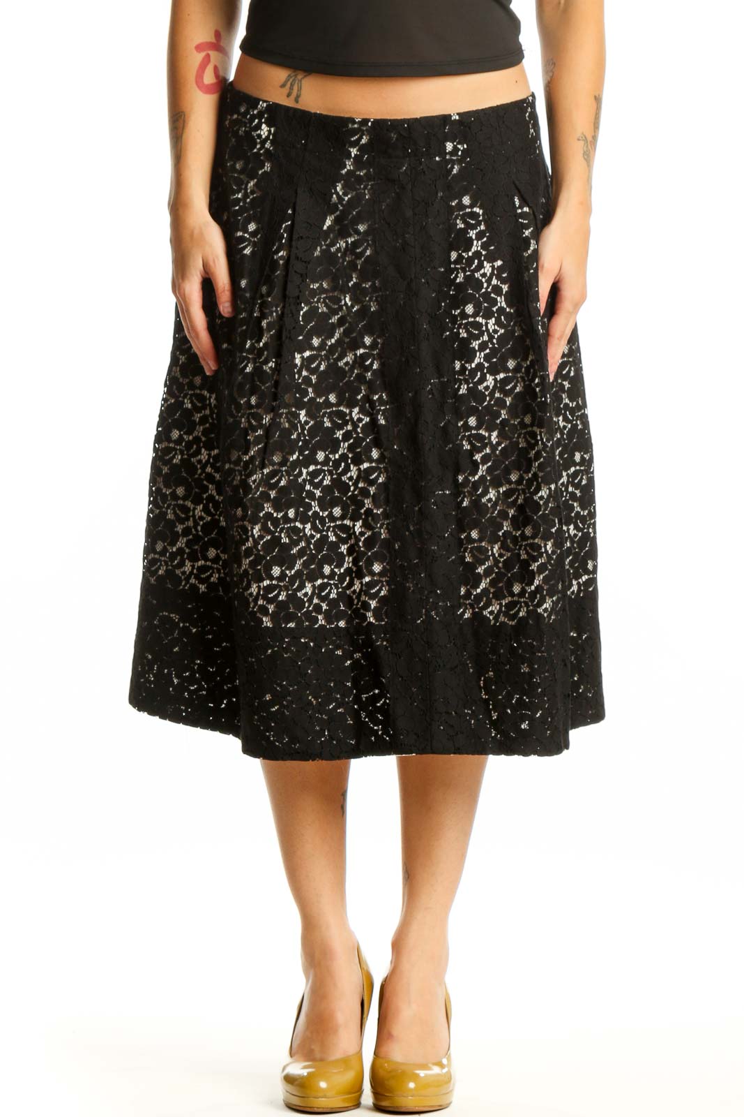 Black lace A-line midi skirt front view, featuring all-over lace pattern and flattering silhouette