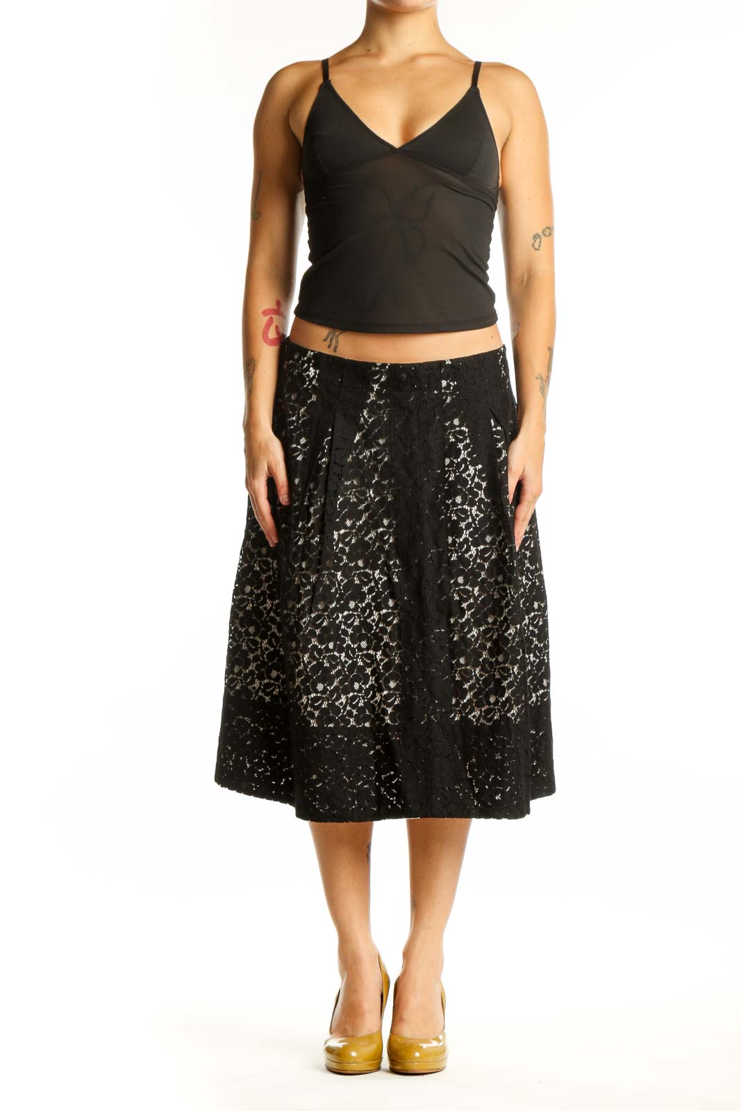 Black lace A-line midi skirt front view, featuring all-over lace pattern and flattering silhouette