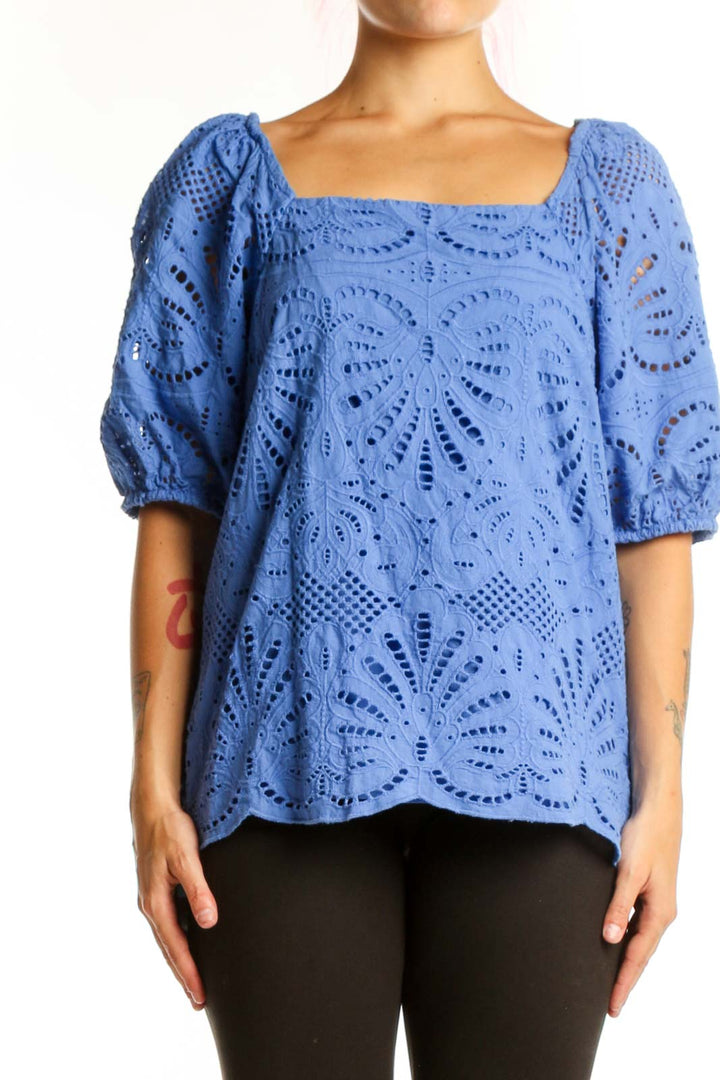 Blue eyelet cotton top with puff sleeves and square neckline, front view