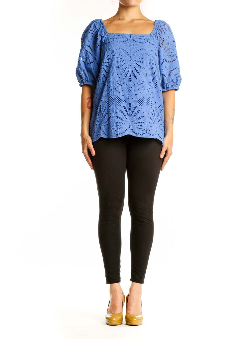 Blue eyelet cotton top with puff sleeves and square neckline, front view