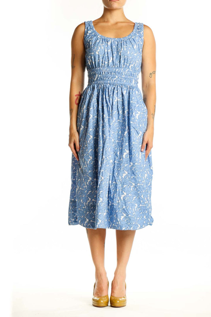Blue floral cotton midi dress with gathered bodice and elasticized waist, front view
