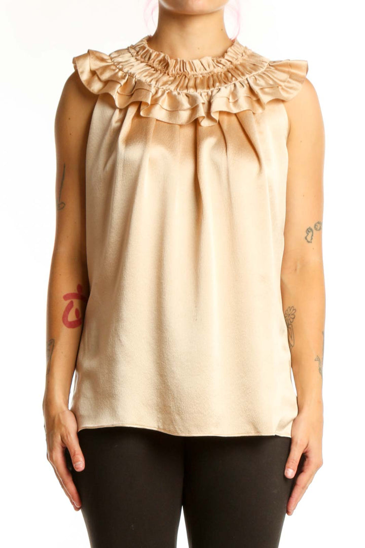 Cream sleeveless blouse with ruffled neckline by Milly, front view