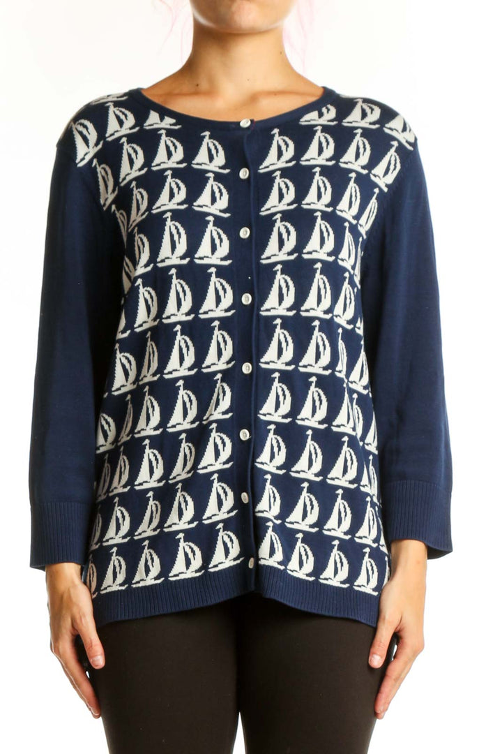 Navy and cream sailboat patterned cotton cardigan with button-front closure and long sleeves