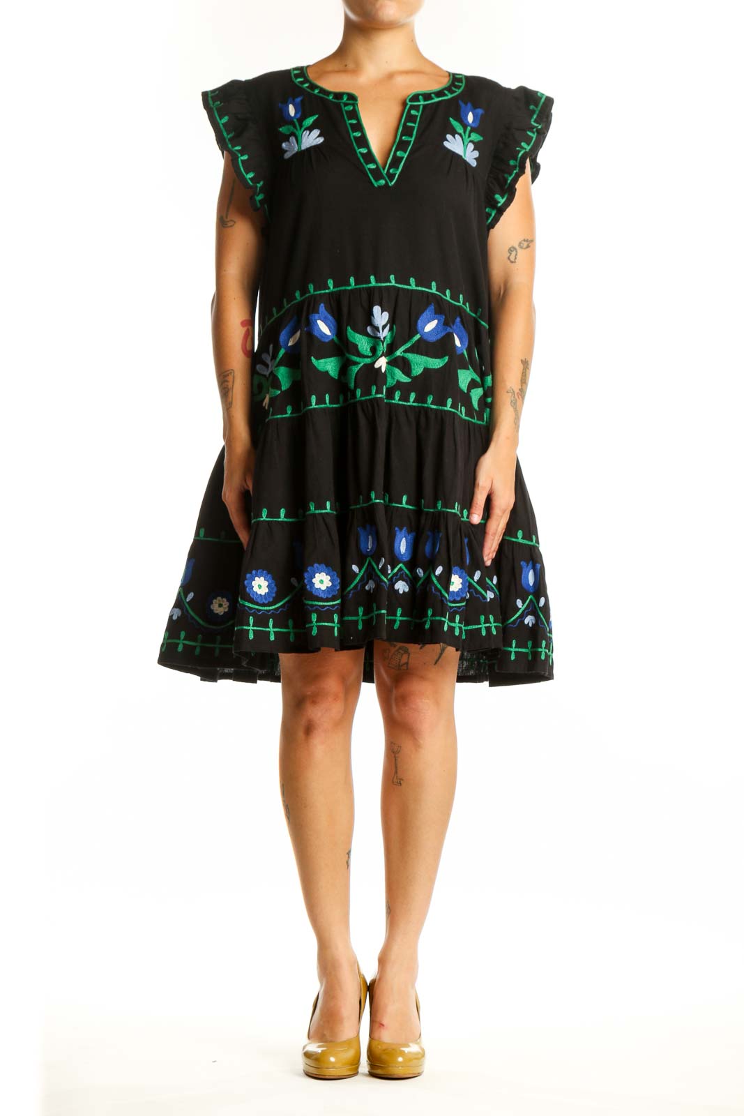 Roller Rabbit black cotton dress with hand-embroidered blue and white floral motifs, tiered silhouette, and flutter sleeves, front view