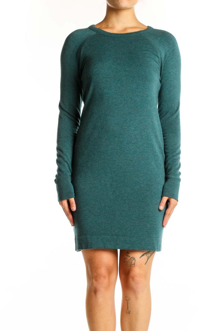 Front view of teal long sleeve knit dress with crew neckline and straight fit