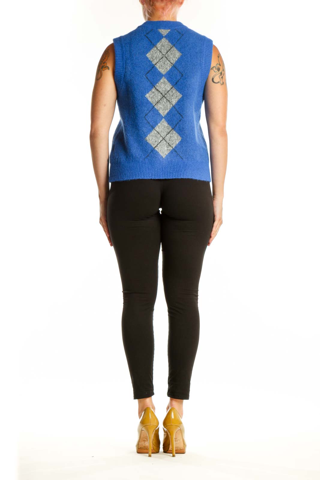 Back view of blue argyle knit vest showing full argyle pattern design and sleeveless cut