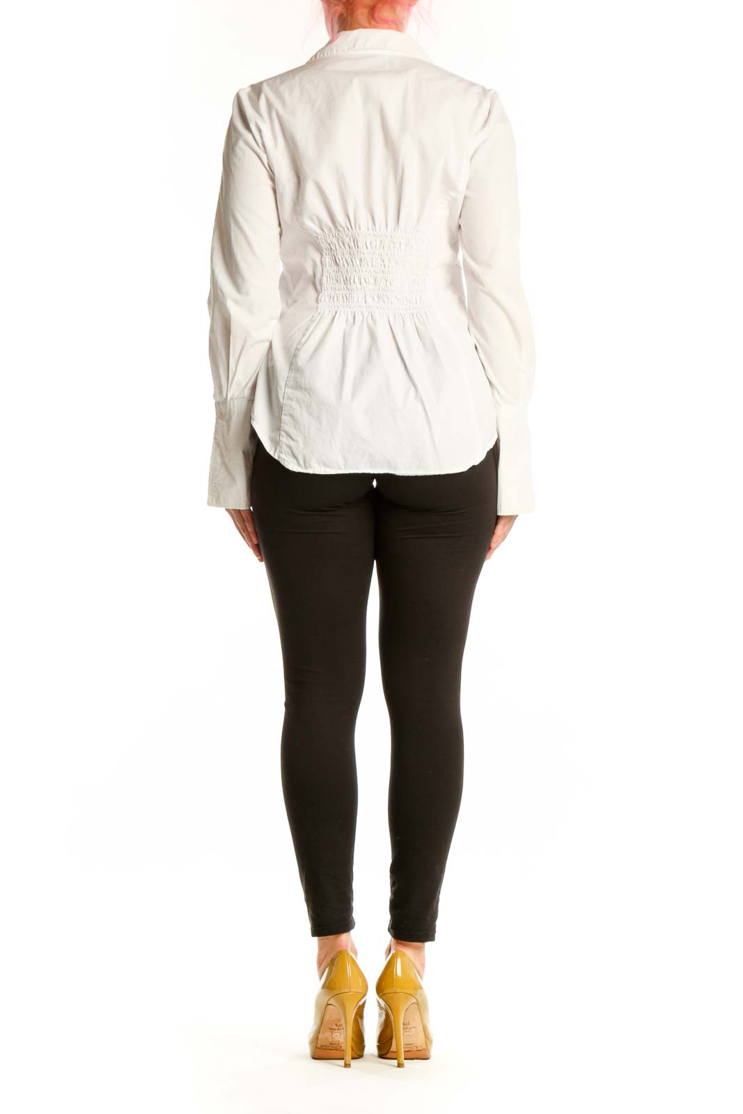 Back view of white cotton ruched button-up shirt showing tailored fit and button closure