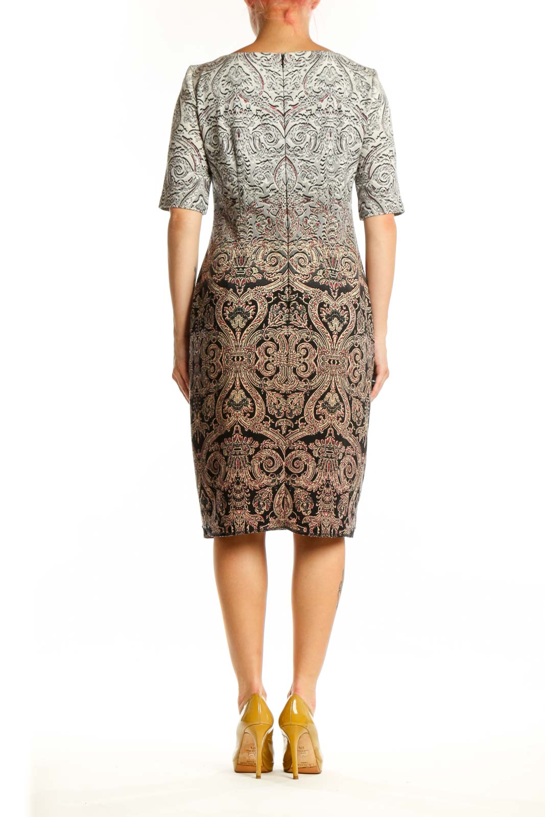 Beige damask print dress with three-quarter sleeves, back view showing fitted silhouette