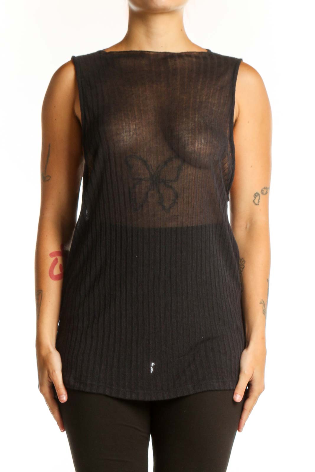 Black ribbed knit sleeveless tank top with crew neckline, front view on model