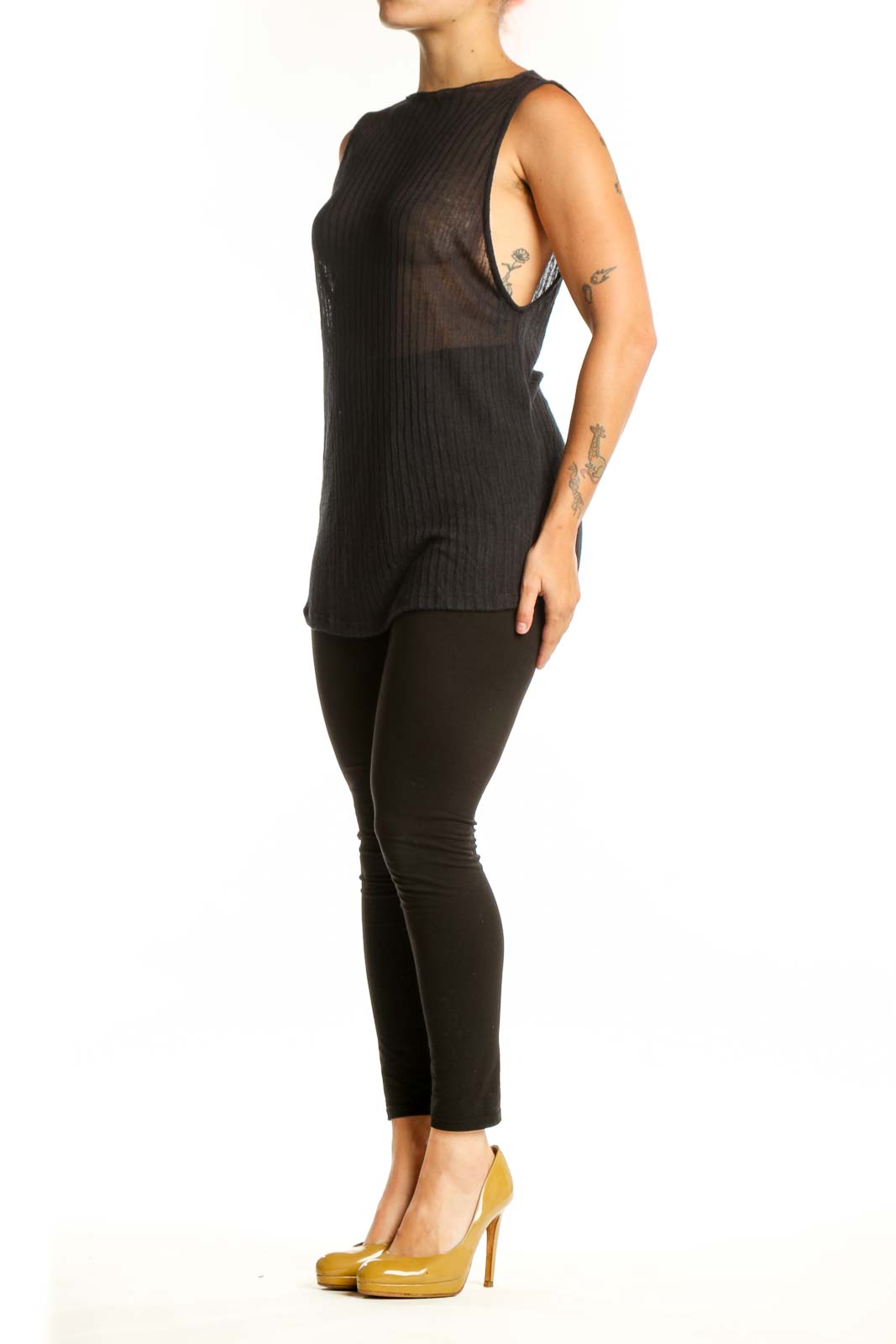 Black ribbed knit sleeveless tank top with crew neckline, front view on model