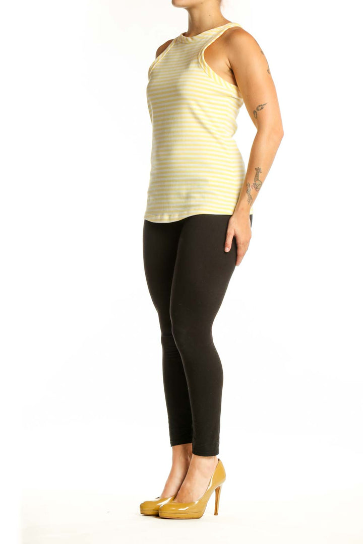 Yellow and white striped cotton tank top with crew neckline, front view