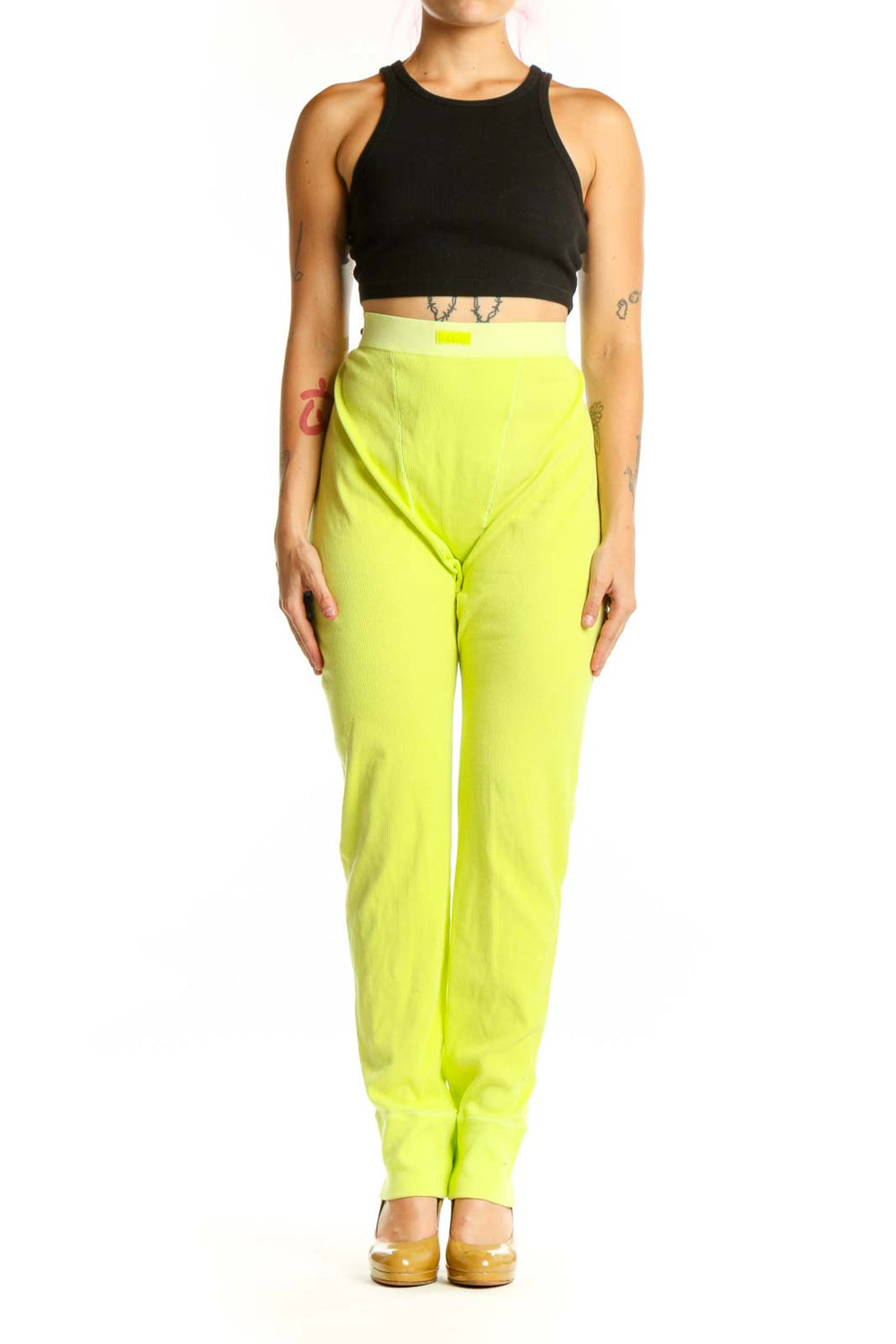 Front view of neon yellow high-waisted stretch pants from Skims in XXL size