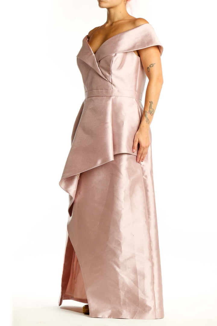 Blush off-shoulder wrap maxi dress with ruffled neckline and asymmetrical layered skirt, front view