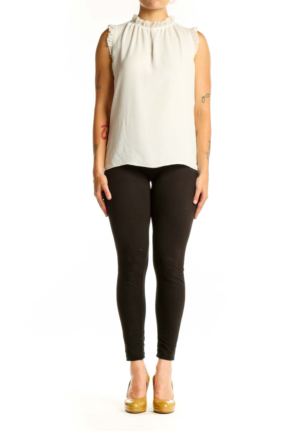 Cream sleeveless top with ruffle shoulder details and crew neckline, front view