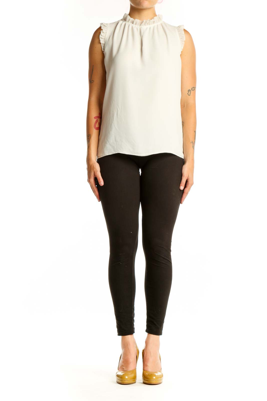 Cream sleeveless top with ruffle shoulder details and crew neckline, front view