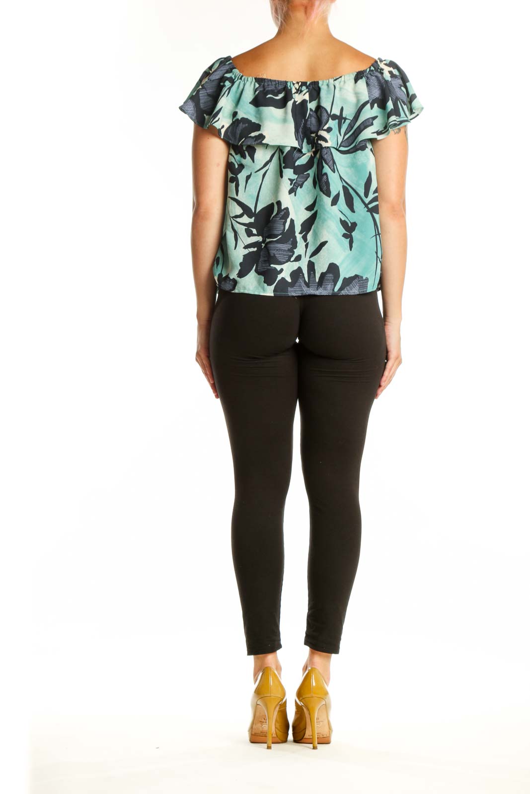 Mint green off-shoulder Maeve top with black floral botanical print, back view showing ruffled sleeves