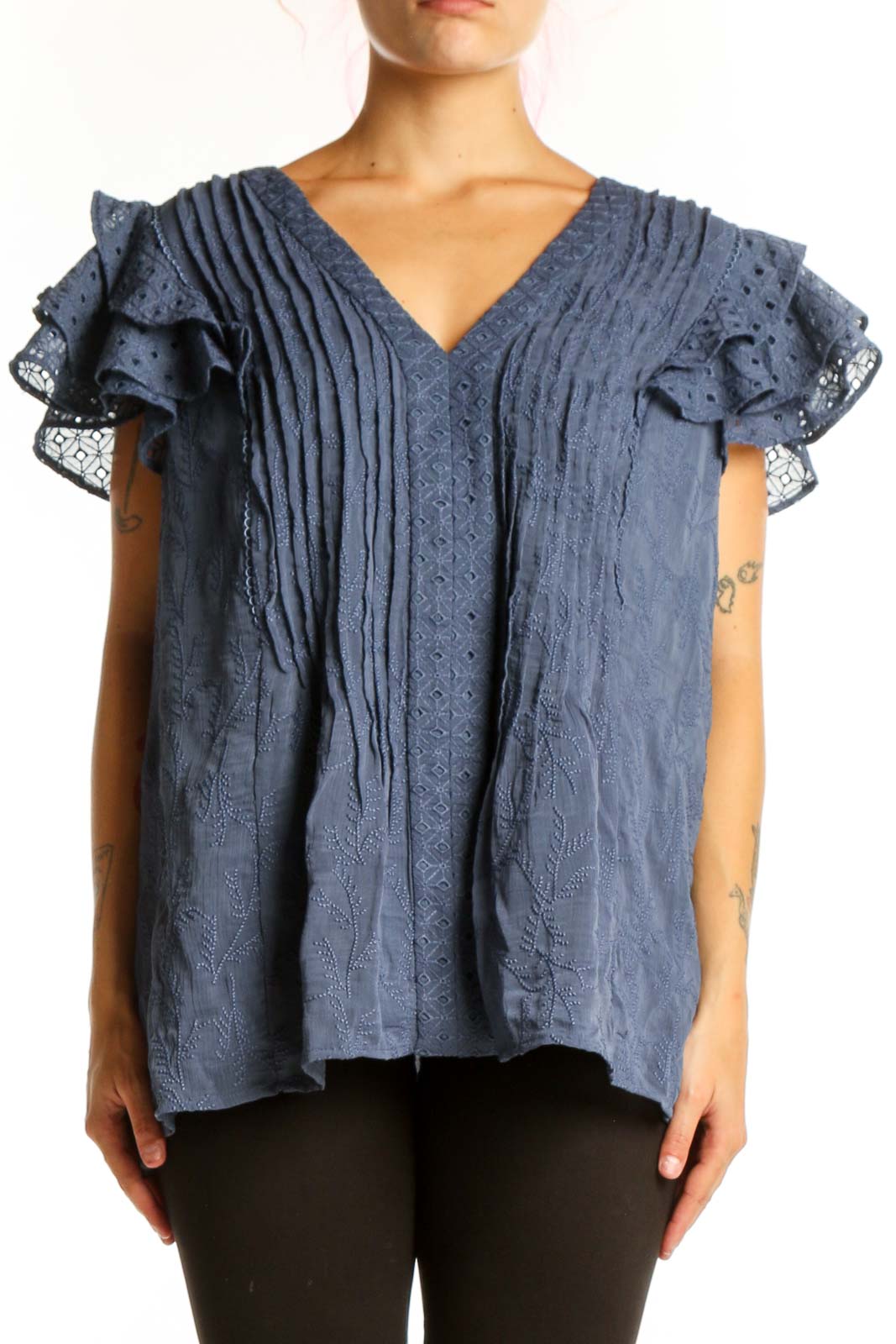 Blue pleated top with ruffled lace short sleeves and V-neckline, front view