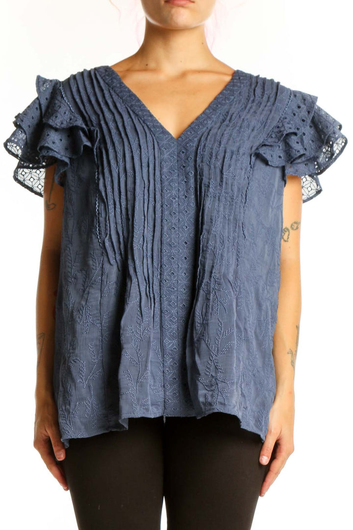 Blue pleated top with ruffled lace short sleeves and V-neckline, front view