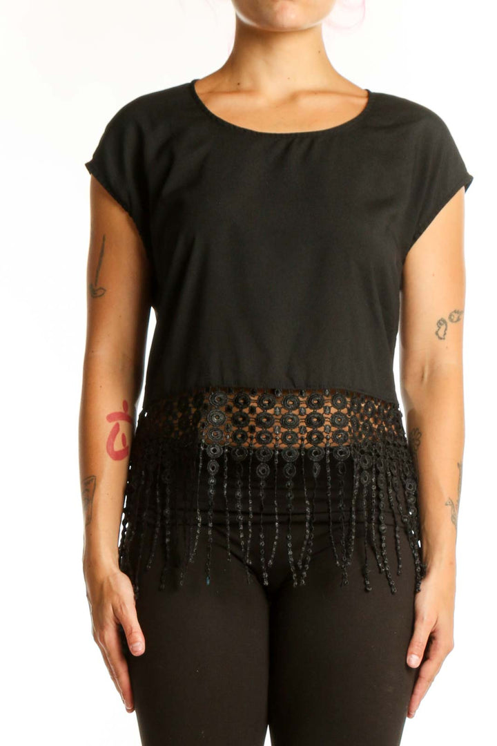 Black beaded fringe crop top front view showing beadwork and fringe detailing at waist
