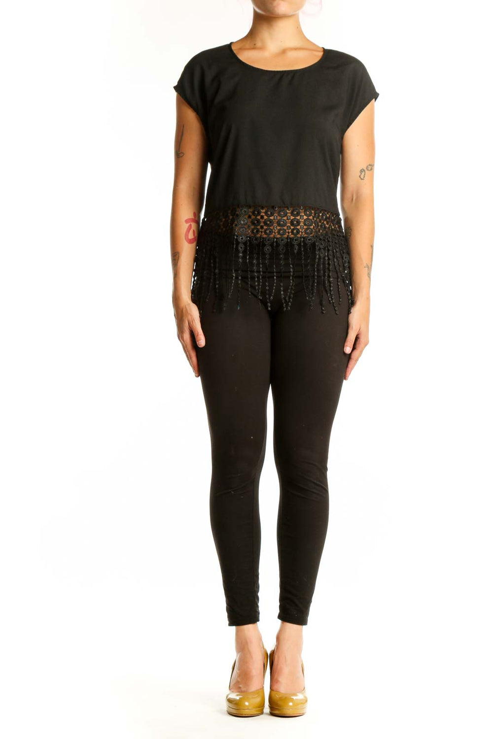 Black beaded fringe crop top front view showing beadwork and fringe detailing at waist