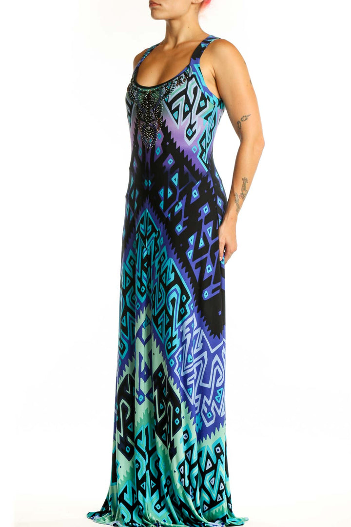 Front view of blue geometric maxi tank dress with vibrant purple and cyan symmetrical print by Donna Morgan