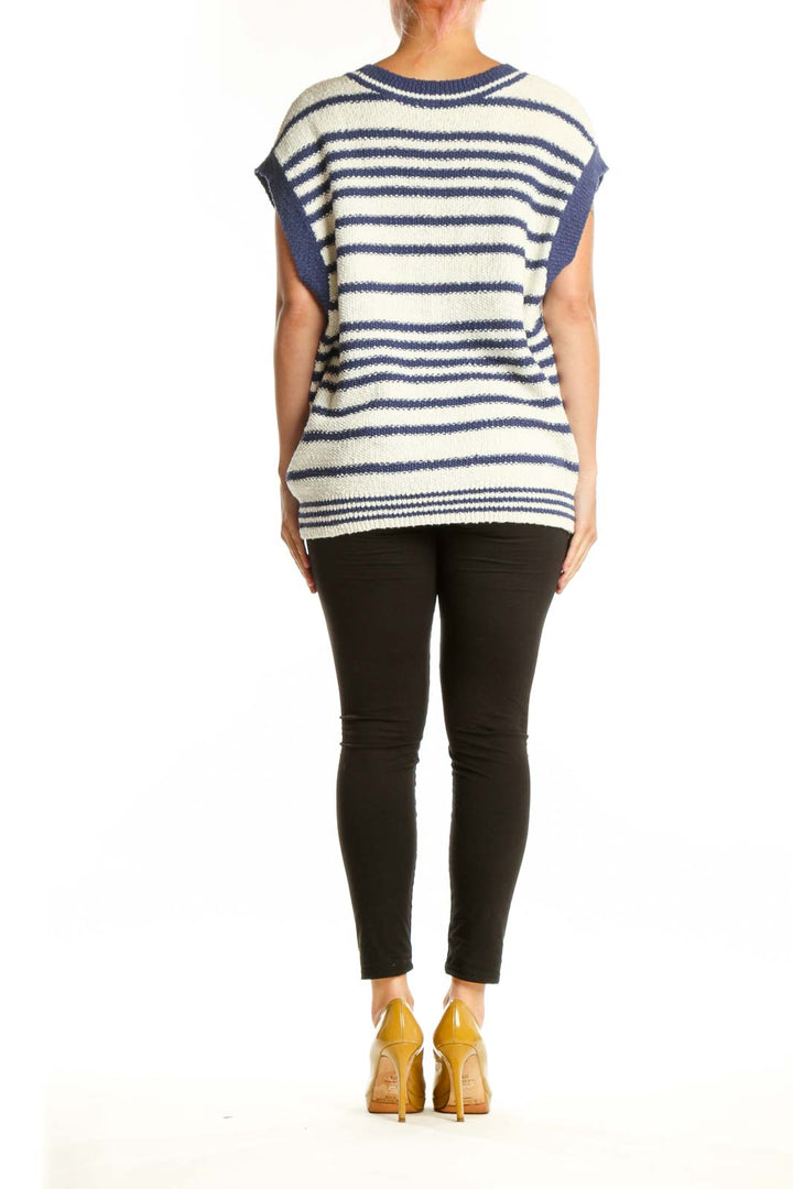 Back view of navy striped Maeve cardigan vest showing horizontal stripe pattern and button-front design