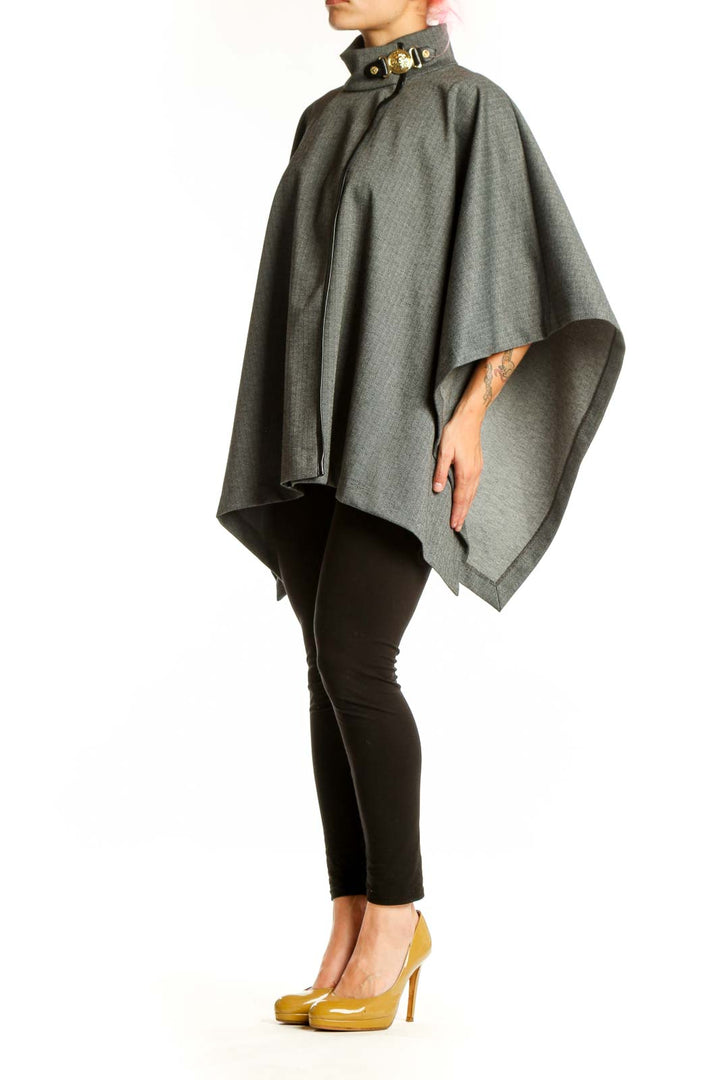 Front view of gray wool blend cape jacket with high buckle collar detail and draped silhouette