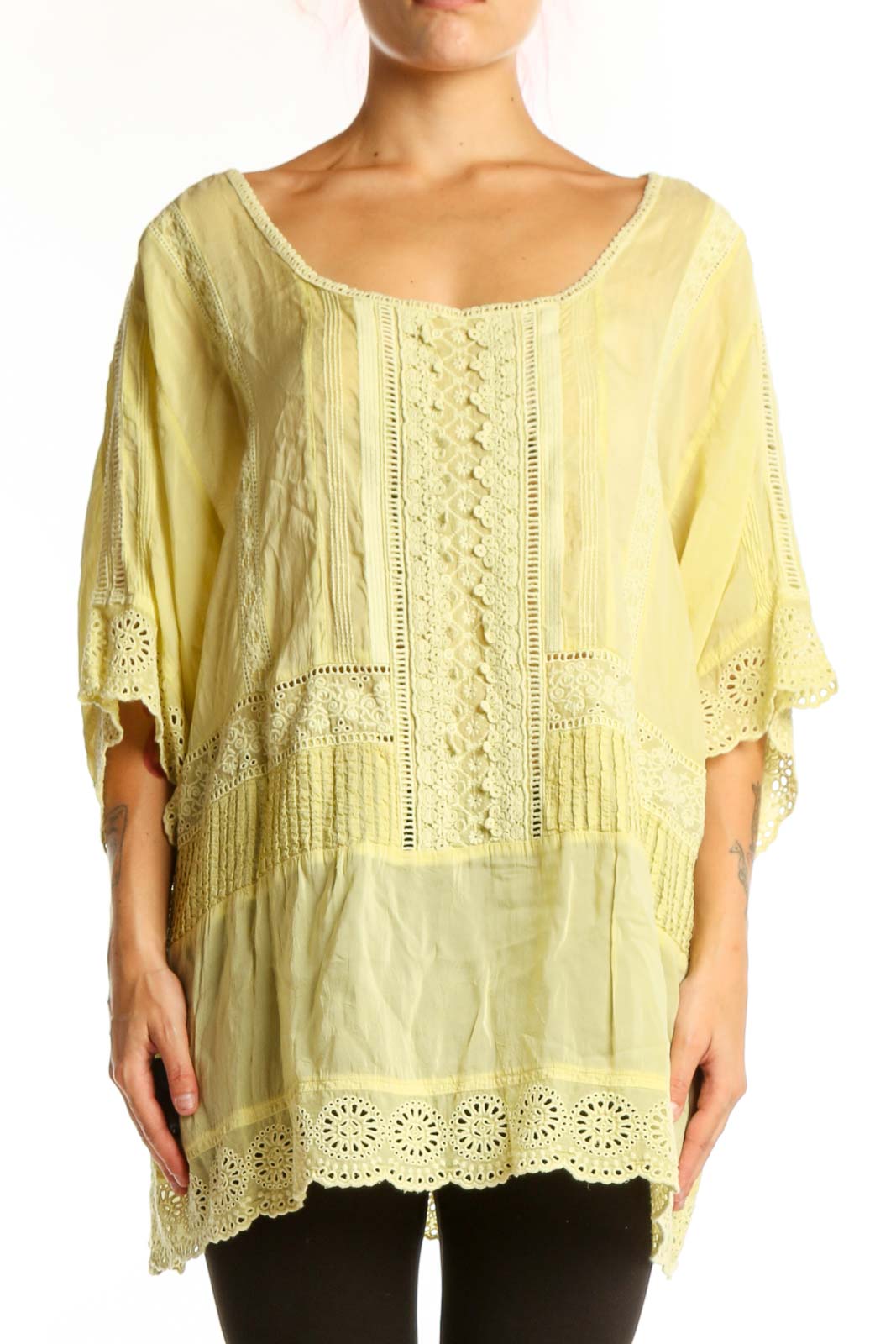Pale yellow rayon tunic top with embroidered center panel and eyelet lace detailing, front view