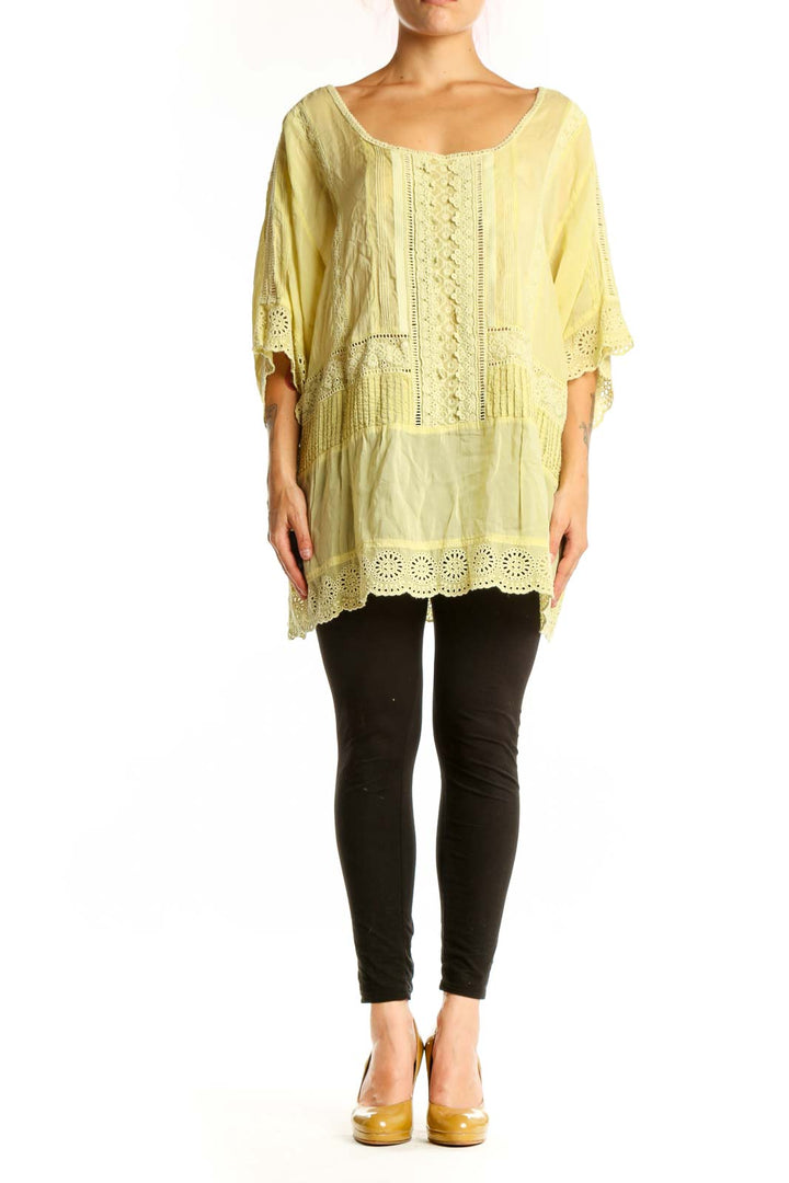 Pale yellow rayon tunic top with embroidered center panel and eyelet lace detailing, front view
