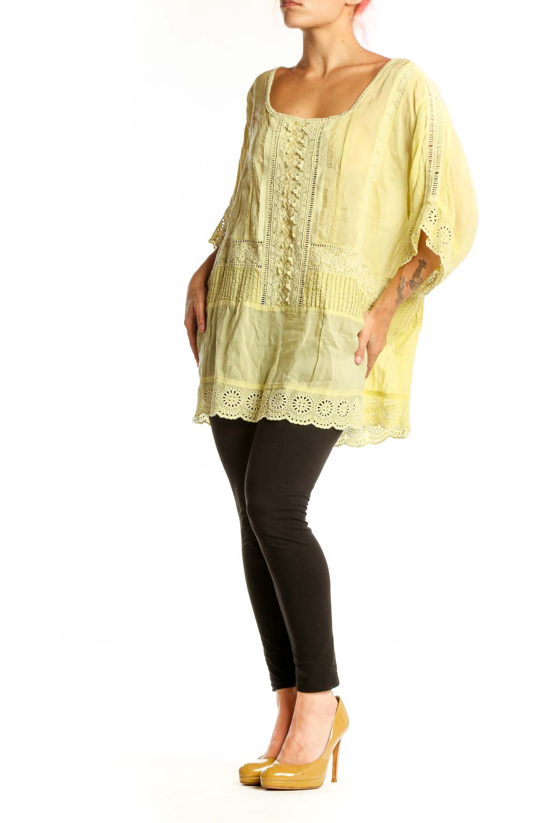 Pale yellow rayon tunic top with embroidered center panel and eyelet lace detailing, front view