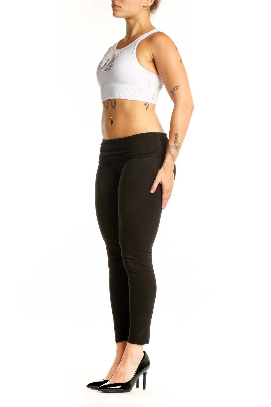 White mesh cutout sports bra with racerback design, front view on model