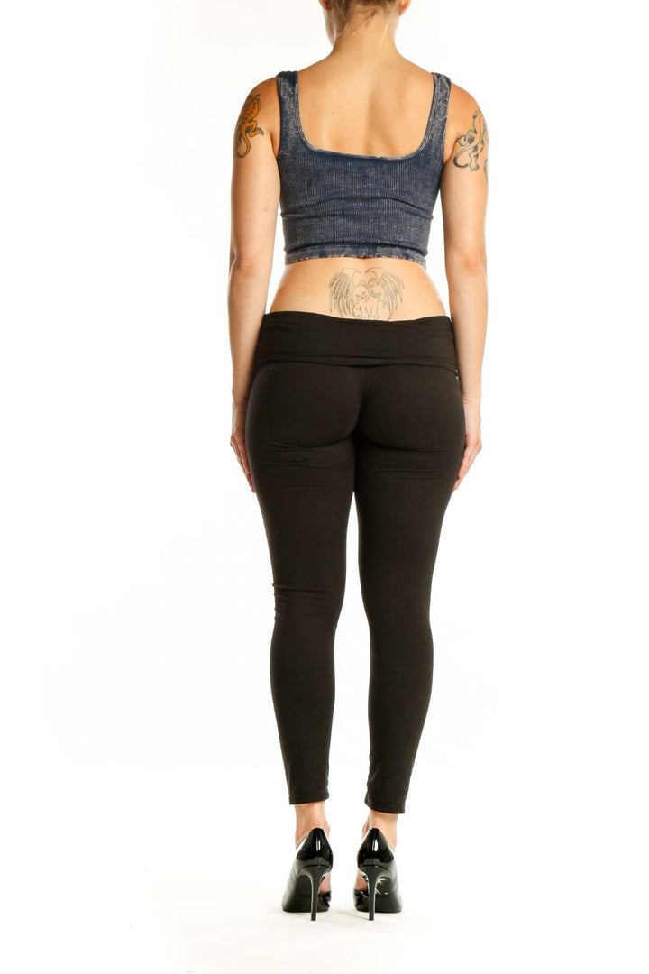 Navy ribbed crop tank top back view showing fitted silhouette and distressed hem detail