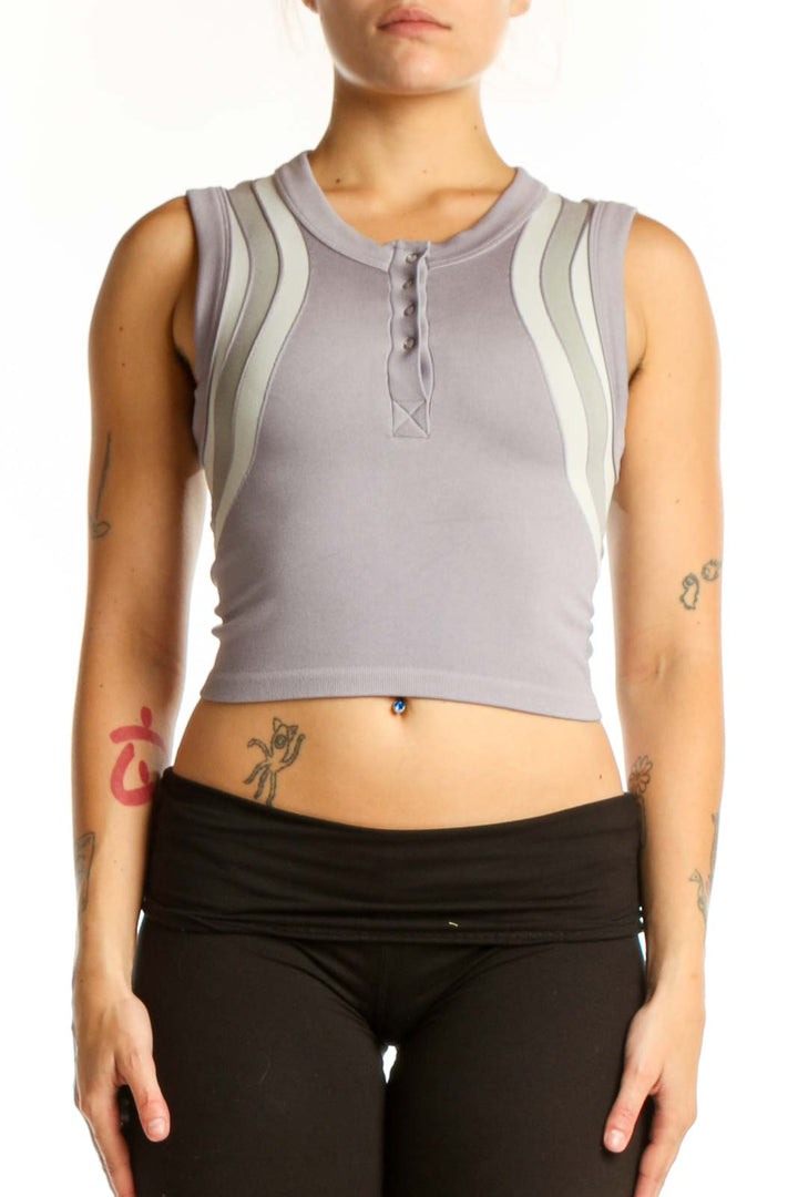 Gray and cream striped crop tank top with color-block design, front view