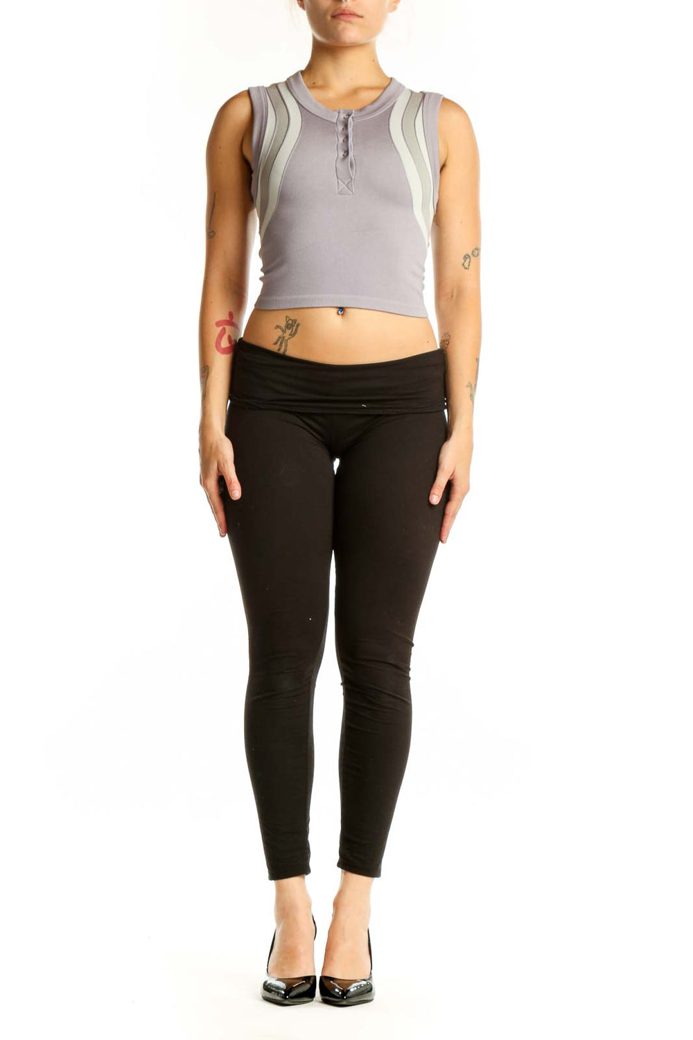 Gray and cream striped crop tank top with color-block design, front view