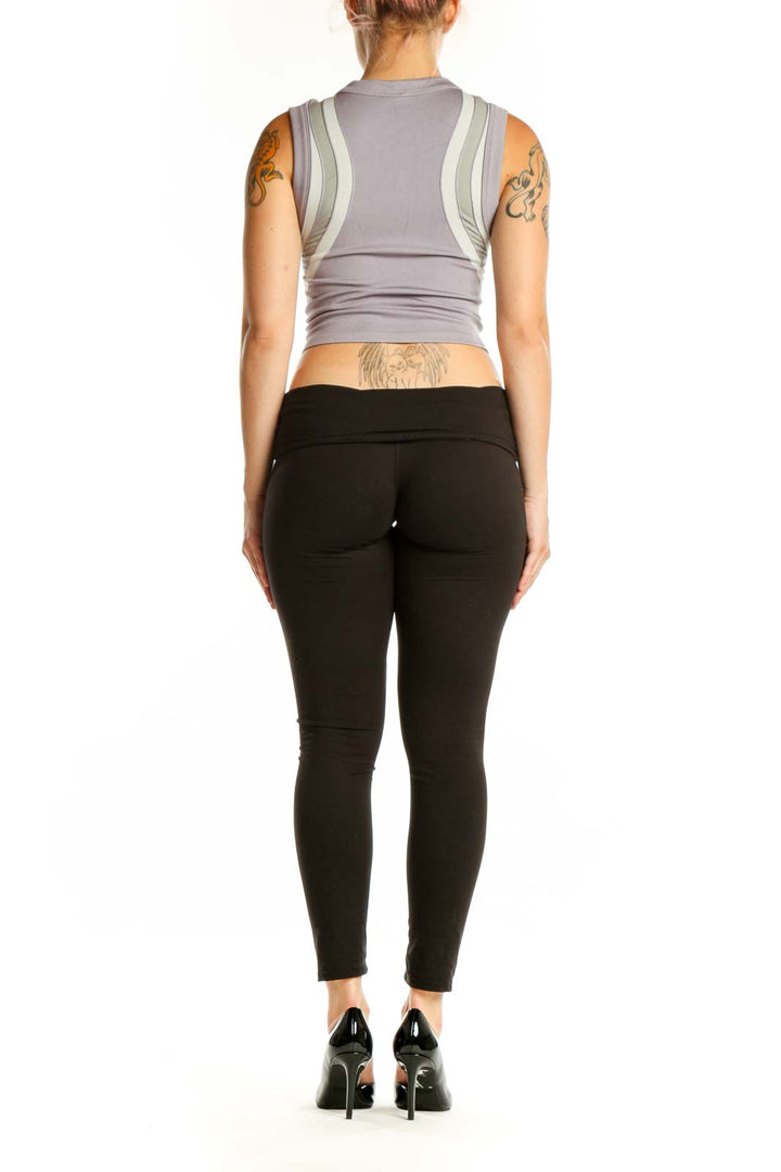 Gray and cream striped crop tank top with color-block design, back view
