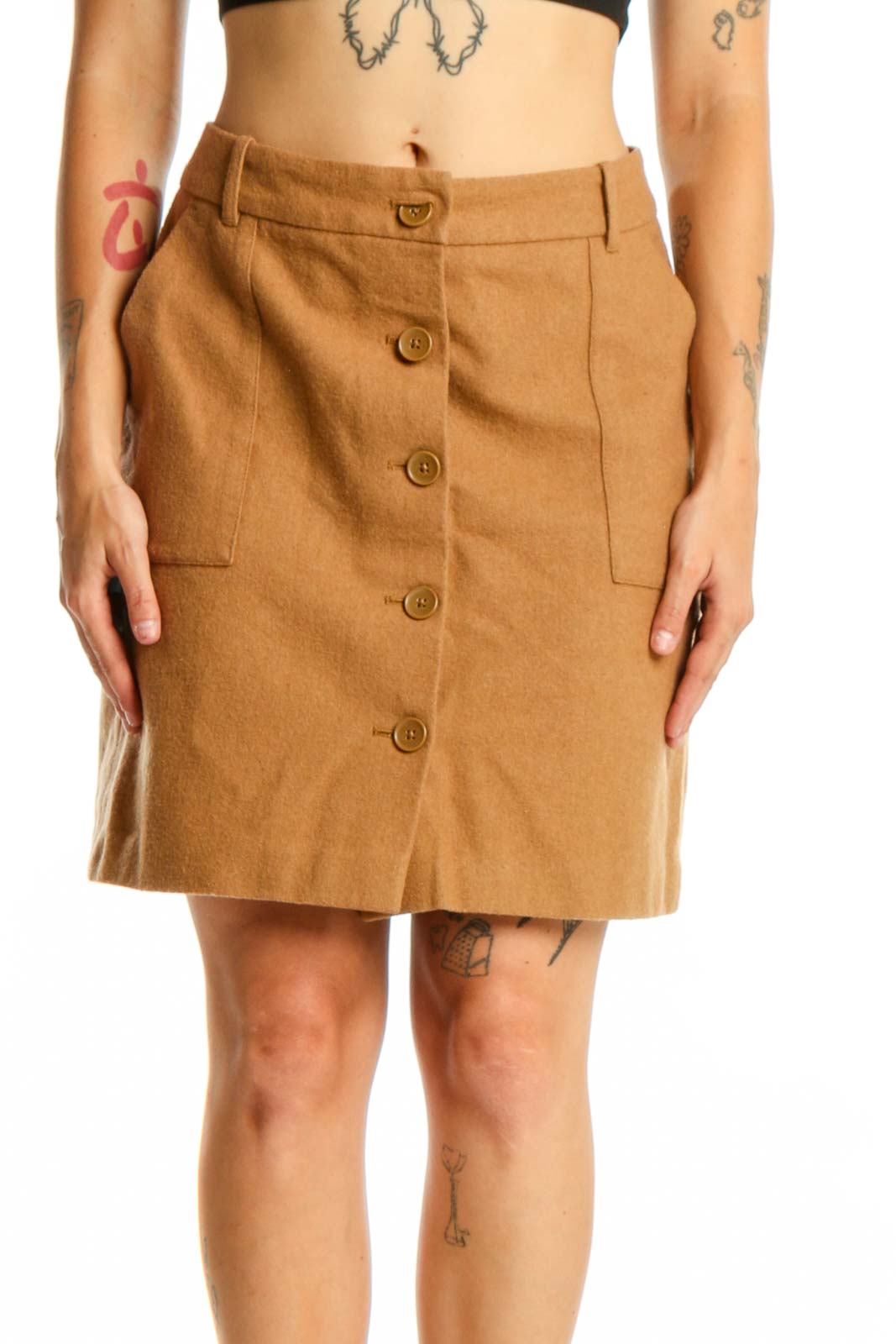 Tan button-front A-line skirt with side pockets and functional buttons, front view